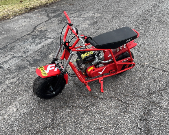 A red GMB100 that has a stock engine