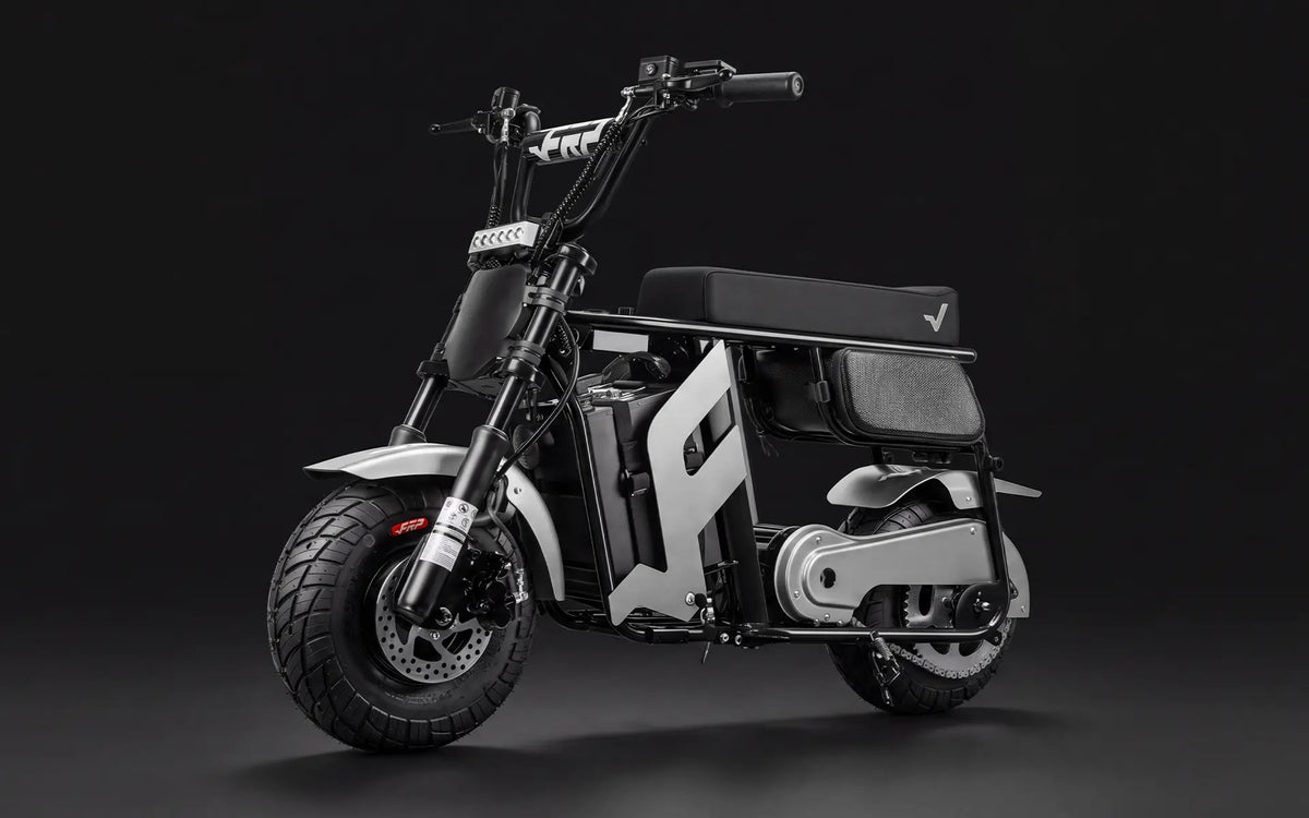 FRP M3 electric mini bike in silver and black, studio three-quarter view