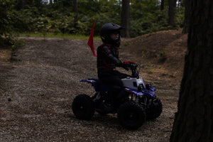 FA40-NEO 40cc kids ATV side profile on trail